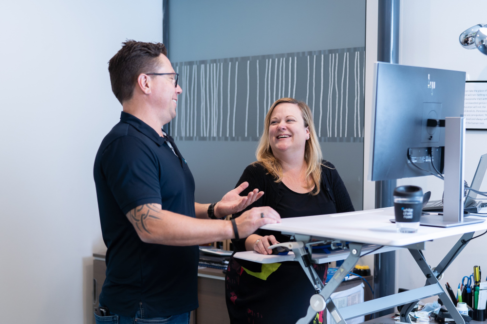 Scotty and Sarah at stand up desk