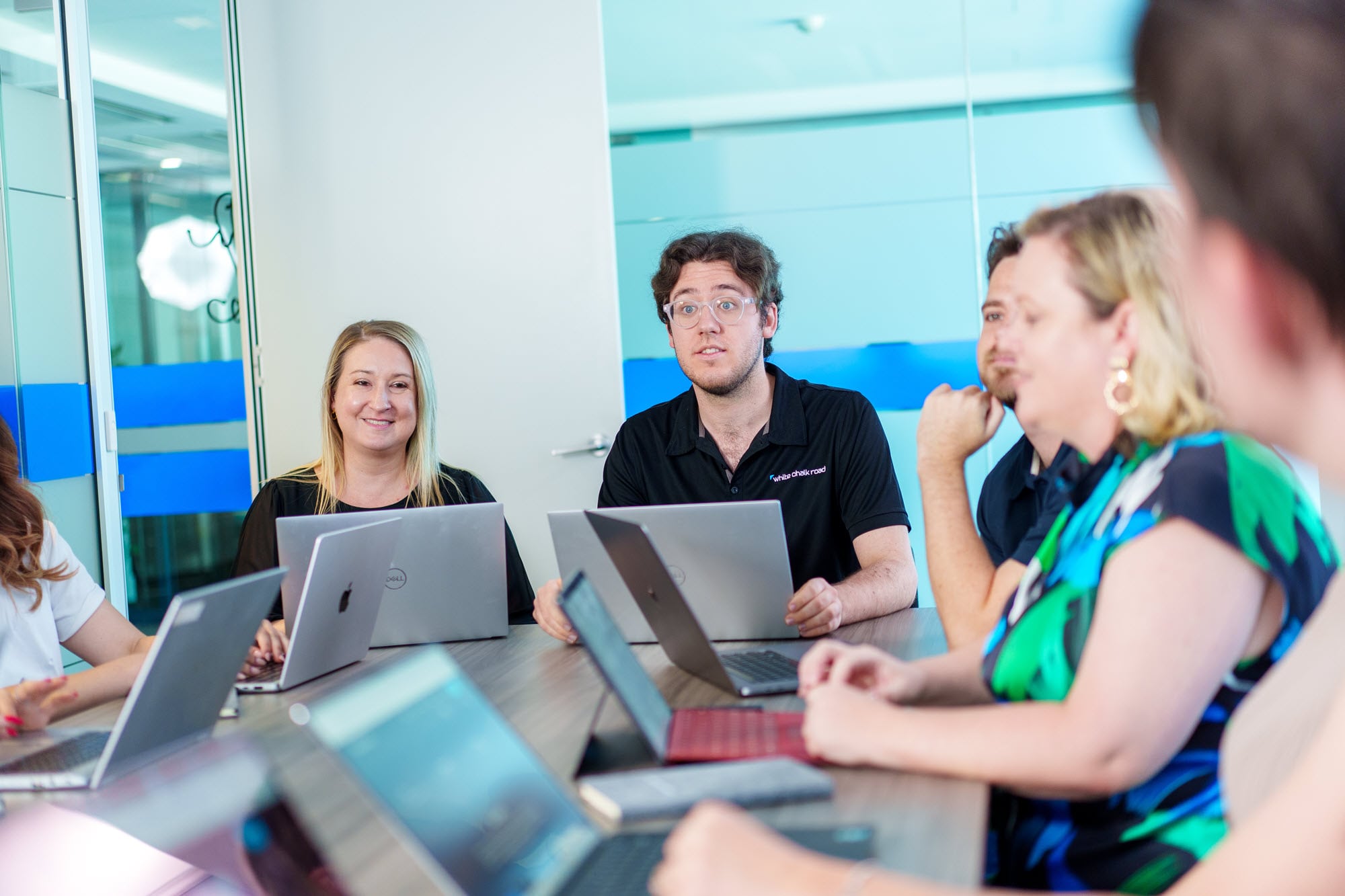 White Chalk ROad staff sitting at a desk with computers